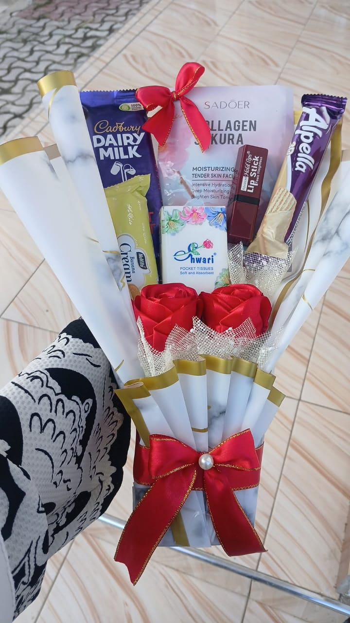 Gift bouquet with roses and beauty treats